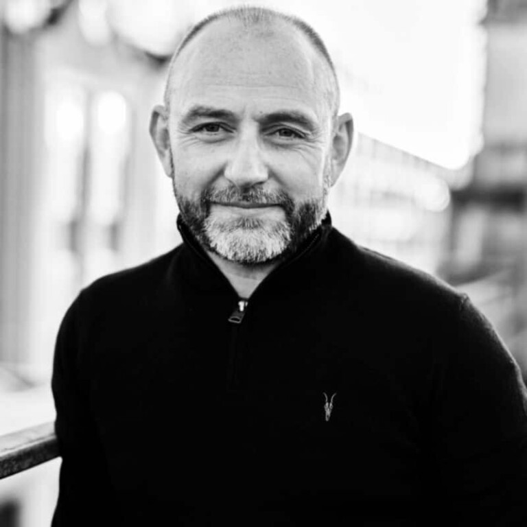 Justin Brown in black and white.